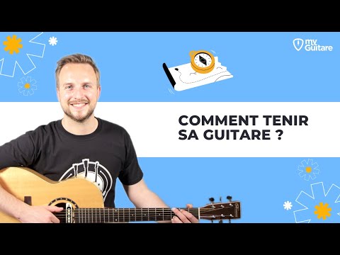 Vidéo: Comment Tenir Une Guitare