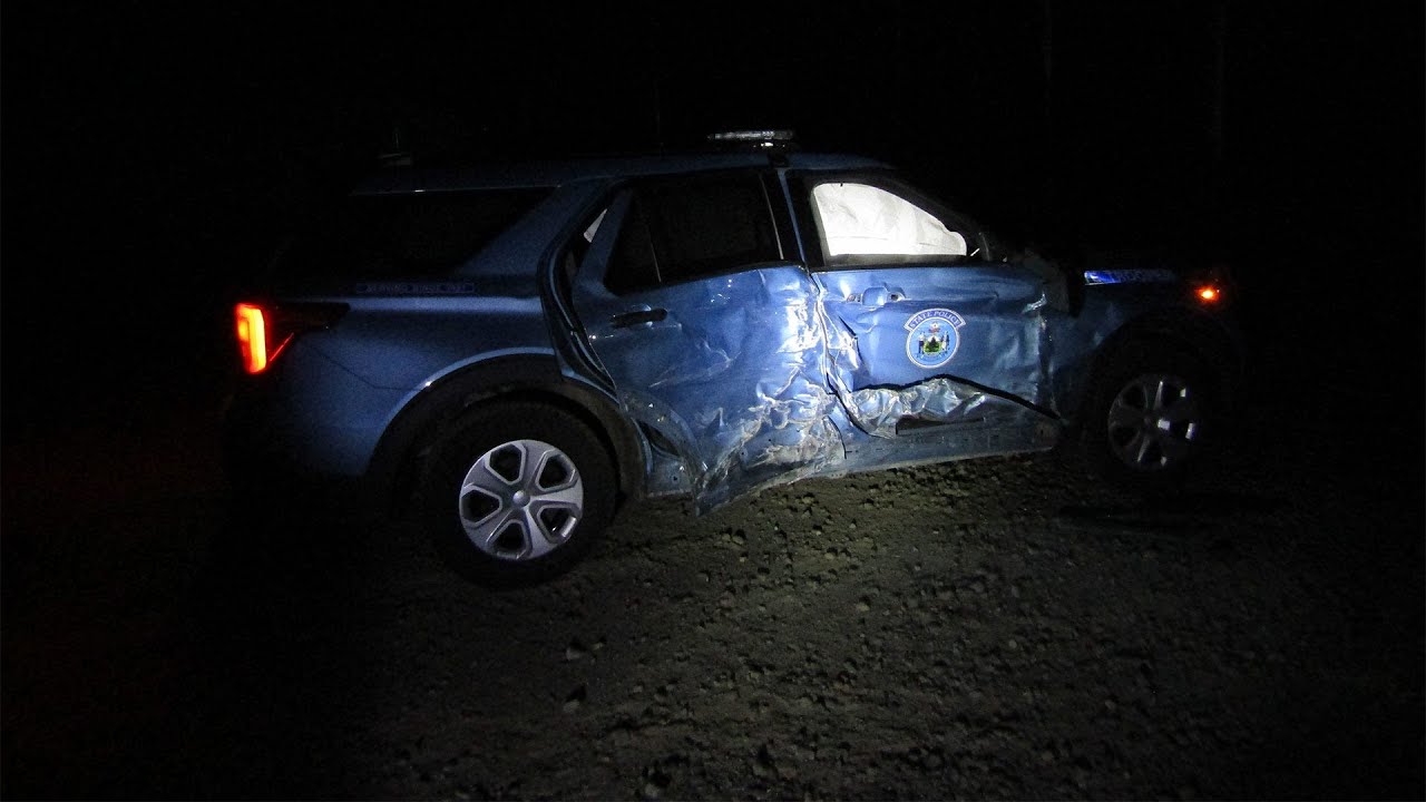 Man dead, trooper injured after van crashes into parked cruiser - YouTube