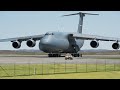 US 420 Ton C-5 Galaxy Plane Guided by Small Car on Runway