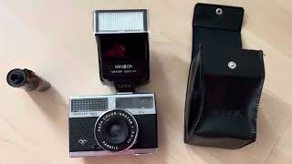 Vintage AGFA Optima 200 Paratic 35mm photofilm camera and Minolta Maxxum 2800AF flash study