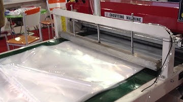 CW-1400FB in Yiwu Exhibition 2013 Flying knife System bottom sealing bag making machine