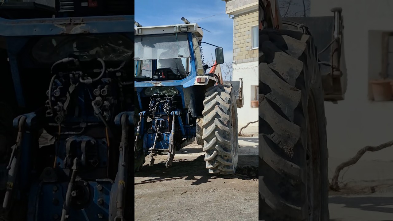 THE TRACTOR'S WHEEL COMES OFF AND IS PUTTED BACK IN PLACE.