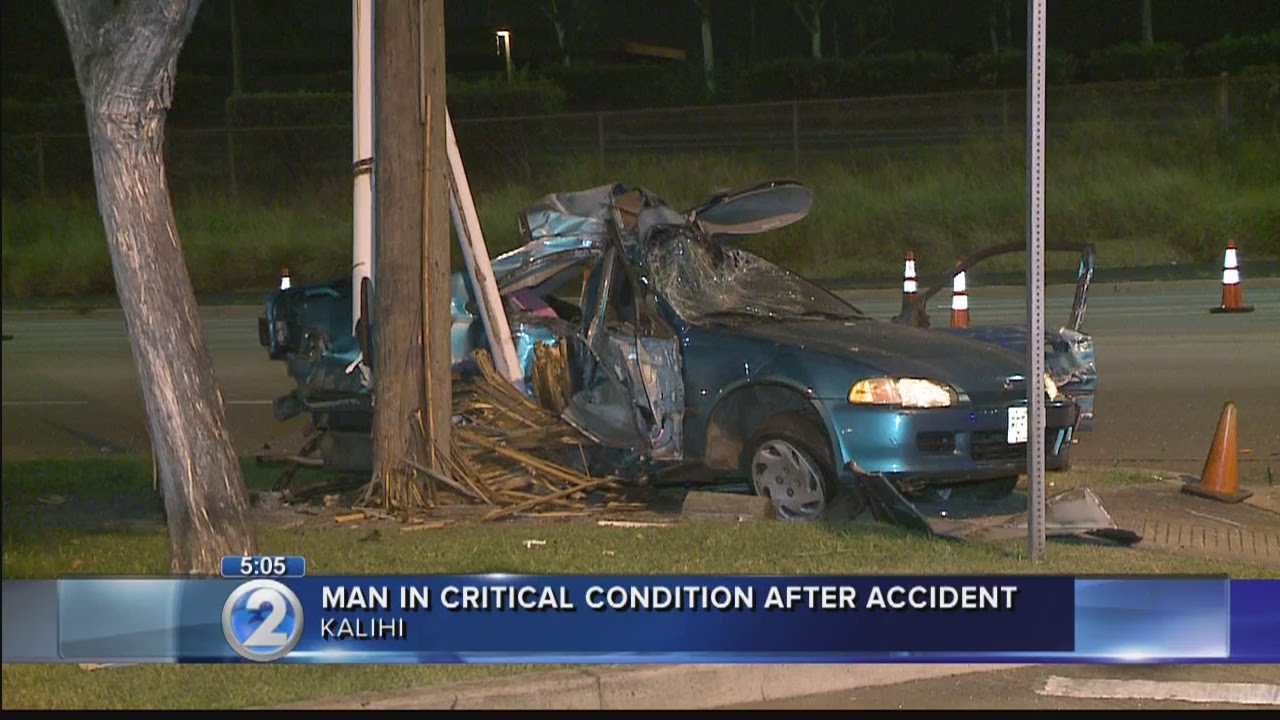 Driver critically injured after hitting bus and power pole - YouTube
