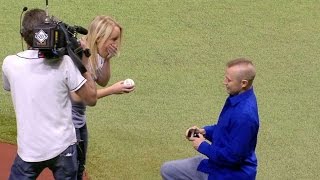NYY@TB: Fan throws first pitch then gets proposed to