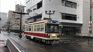 長崎電気軌道1200形1205号が走行するシーン