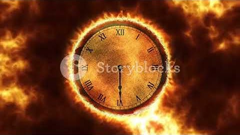 Burning Clock With Roman Numerals With Fire In The Background Seamless Loop 4K