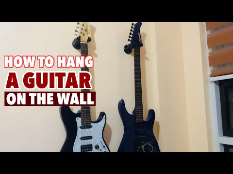 Video: Paano Mag-hang Ng Gitara Sa Dingding