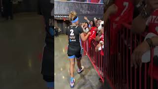 Te-Hina Paopao signs for the fans after the game