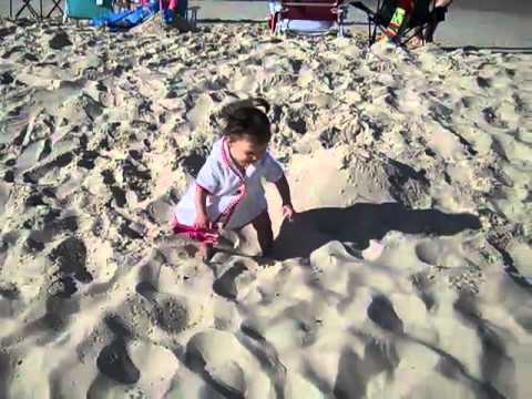 Jackson and Jo playing in the sand