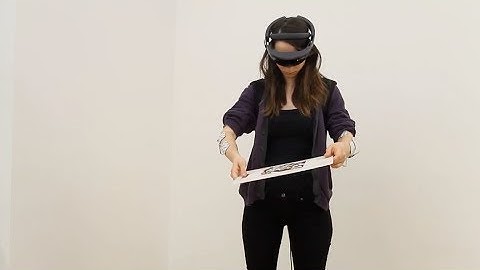 Feel virtual objects you touch in augmented reality (HoloLens + Electrical Muscle Stimulation)