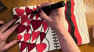 Sketch booking with red and dark red Posca acrylic markers.