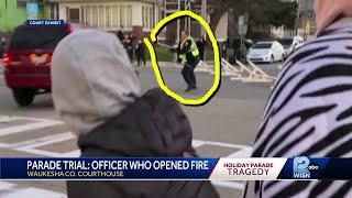 Officer who opened fire on parade suspect takes witness stand
