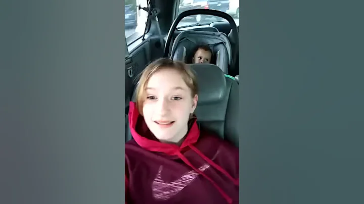 Lilly Anne Dennison singing to her little brother