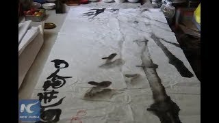 Blind man paints the world of his imagination