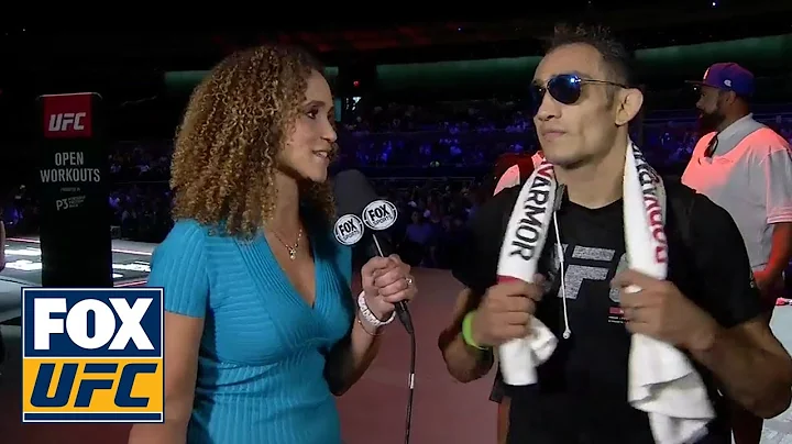 Karyn Bryant talks with Tony Ferguson after his op...