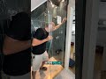 Frameless custom shower glass door installation with precision sealing and alignment⚒️😯