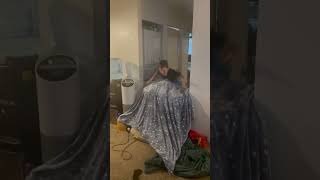 Boy runs through hallway then jumps over pillows and covers and lands in scorpion position