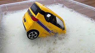 Cool Diecast Model Cars Sliding Into The Foam And Water