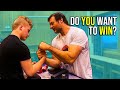 DEVON LARRATT GIVES ADVICE TO BEGINNER ARMWRESTLER