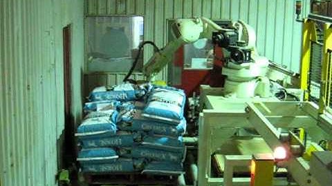 Robot Palletizer running animal feed - Wise Packaging Equipment Ltd