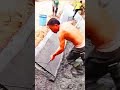 Concrete channel finishing method ensuring smooth roadside drainage flow"