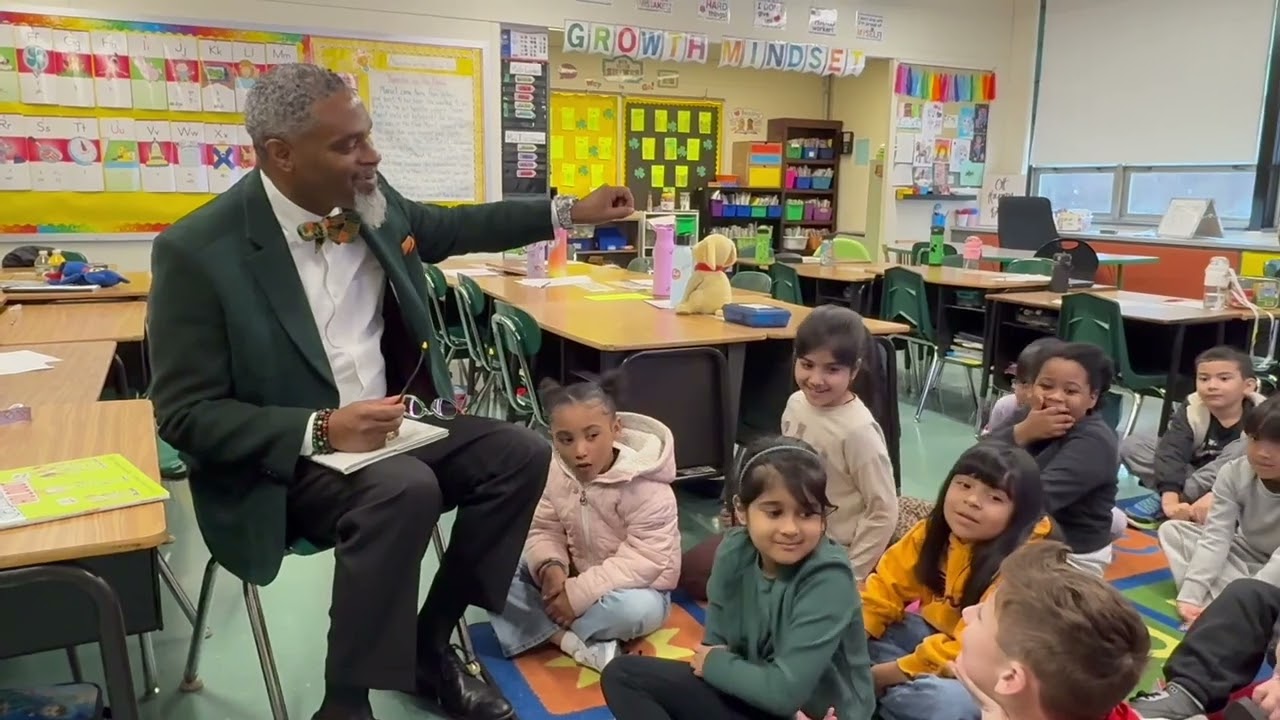 Video preview image of superintendent reading to students; click to visit the ParentSquare post with the video