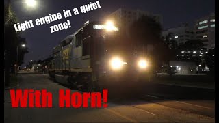 CSX street running engine blows horn in quiet zone!