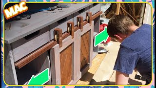 Making A Sliding Barn Door TV Console This custom piece of furniture was built using laminated pine with some oak wood for the parts that were going to be load-bearing.