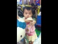 Baby TongTong playing merry-go-round
