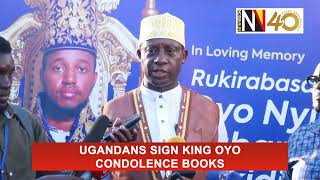 Ugandans sign King Oyo condolence books