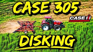 Case 305 disking rye ground with a case 496 disk.
