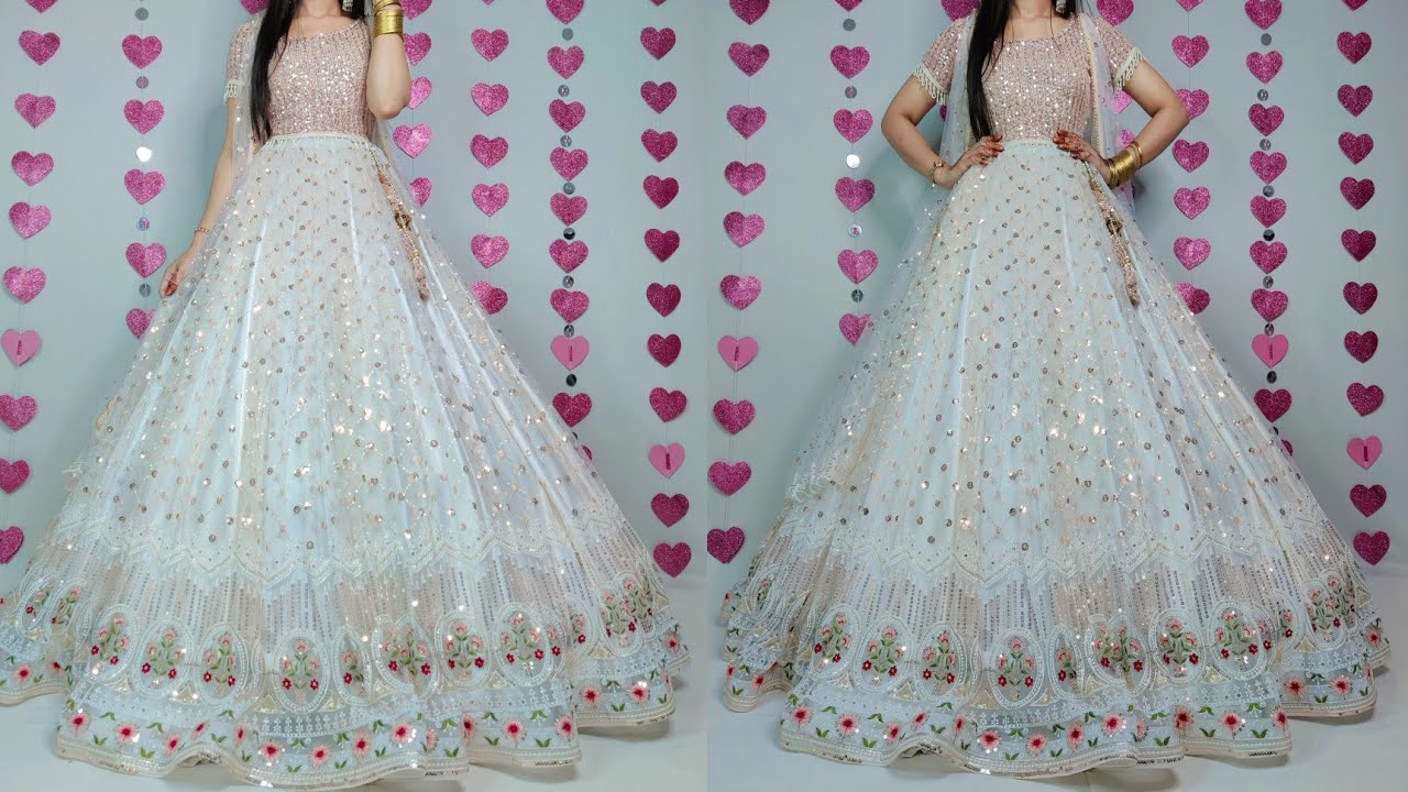 Cream Flamboyant Party Wear Long Net Gown at best price in Surat