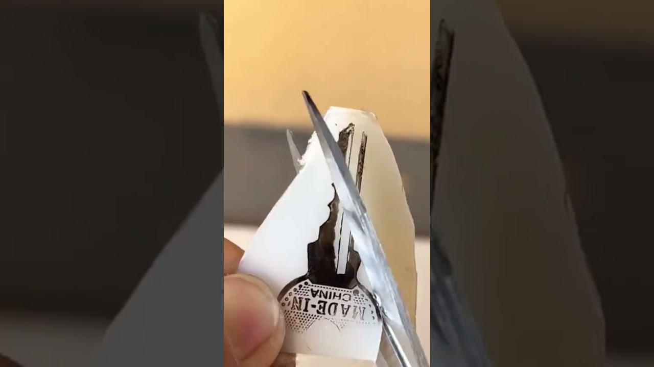 the process of making a duplicate padlock key using a plastic bottle 