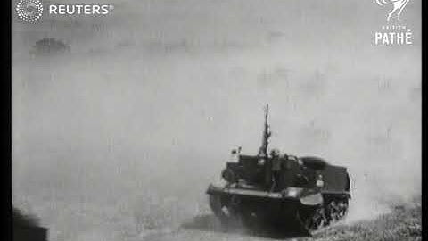 Bren Gun Carriers transport soldiers and support weapons in demonstration of their capabil...(1941)