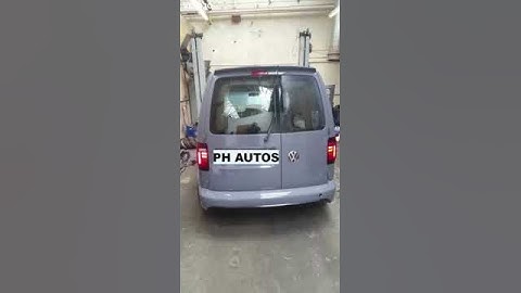 VW CADDY FITTED WITH FACELIFT REAR LIGHTS.