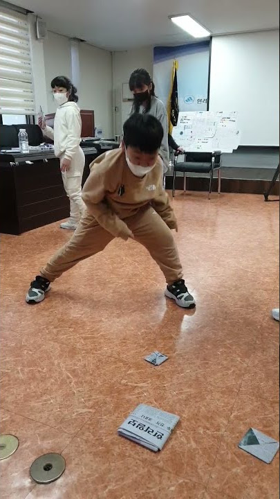 Children playing a traditional Korean game from the squid game