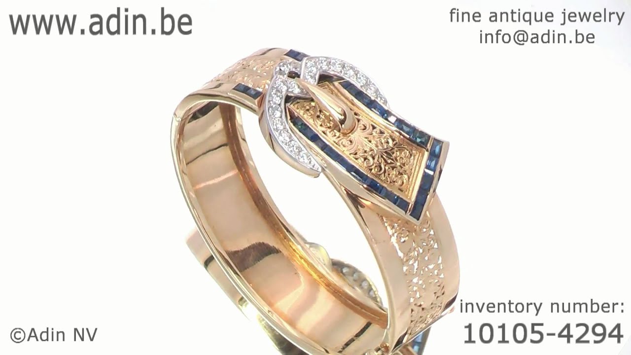 Extreme decorative Art Retro/Fifties gold bangle set with diamonds and sapphires (10105-4294)