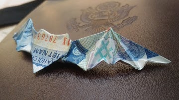 Làm trái tim có cánh từ đồng tiền.