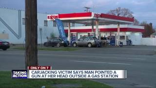 Carjacking victim says man pointed a gun at her head outside a gas station