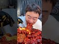 Spicy stir-fried octopus with turkey noodles, crab roe, fried skewers, and chicken drumsticks