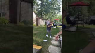 Boy holding a can of white claw gets hit on the face by soccer ball