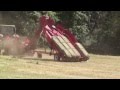 Massey Ferguson 1839 square Baler pulling a Kuhns accumulator at Walley Farms