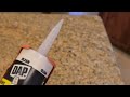 How to cut the caulk tube at the correct angle for installation.