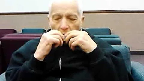 Dale Thacker playing his harmonica