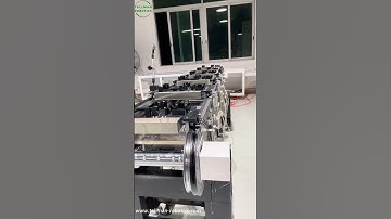 TallMan Robotics: Chain Drive Vertical Circular Conveyor Line