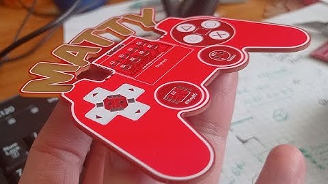 Custom TinyJoypad PCB with Tiny Invaders game.