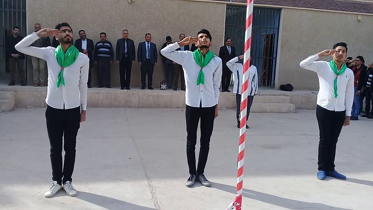 مراسيم رفع العلم العراقي في اعدادية جابر بن حيان في الفلوجة