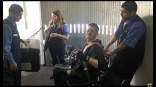 Paraplegic Boarding an Airplane.