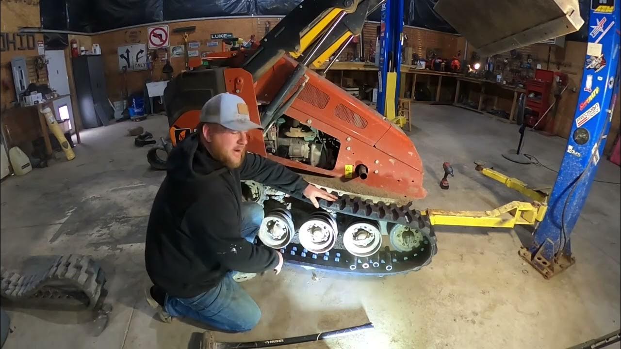 Changing tracks on a Ditch Witch sk800 - YouTube
