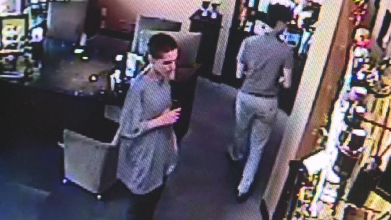 Men caught on camera stealing pricey sunglasses - YouTube